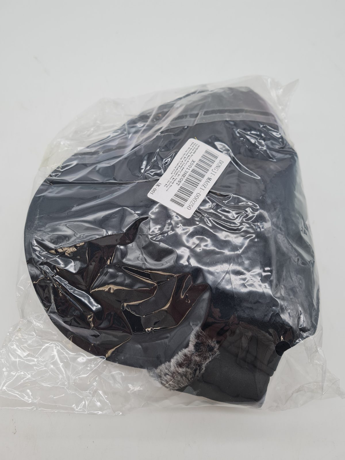 Faux-fur-lined winter cap with ear flaps â€” photograph 4