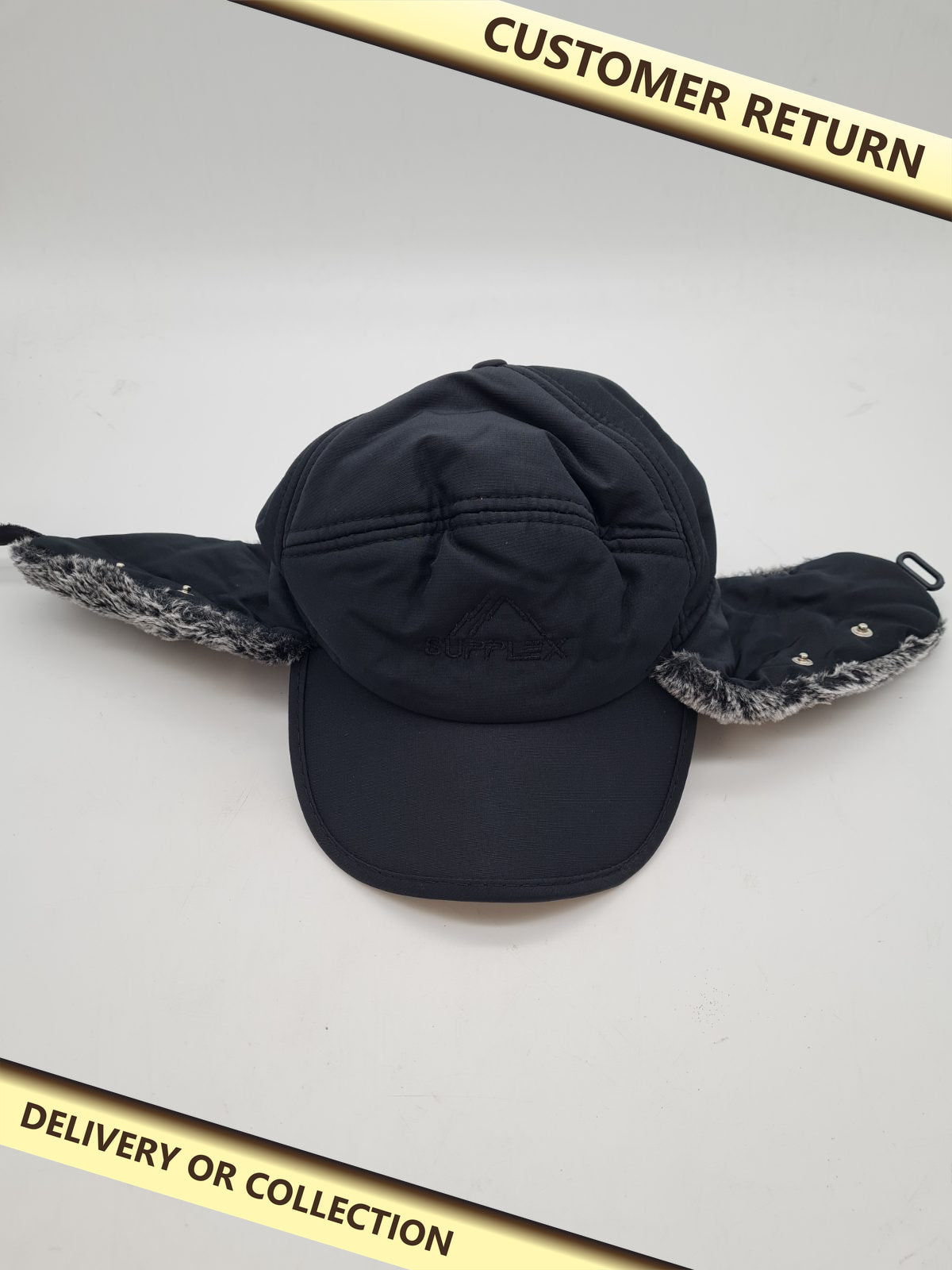 Faux-fur-lined winter cap with ear flaps â€” photograph 1 — Customer return; auction delivery information shown on image