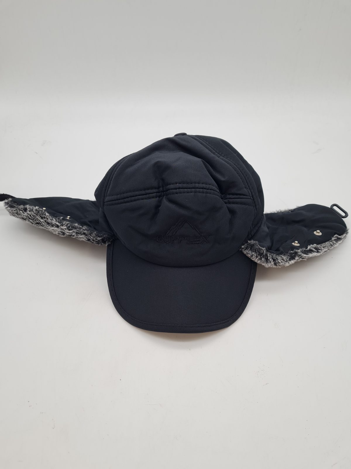 Faux-fur-lined winter cap with ear flaps â€” photograph 1