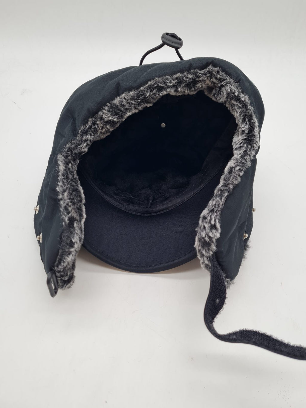 Faux-fur-lined winter cap with ear flaps â€” photograph 3
