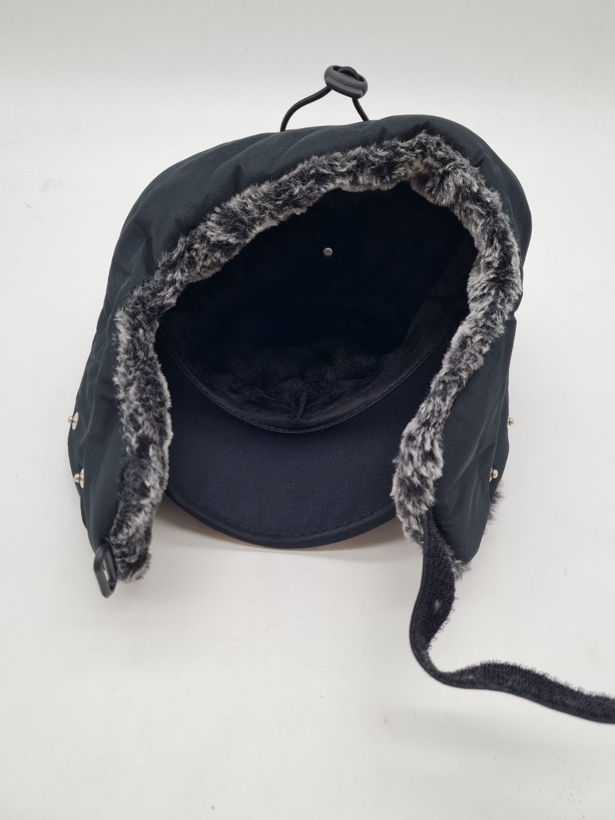 Faux-fur-lined winter cap with ear flaps â€” photograph 3