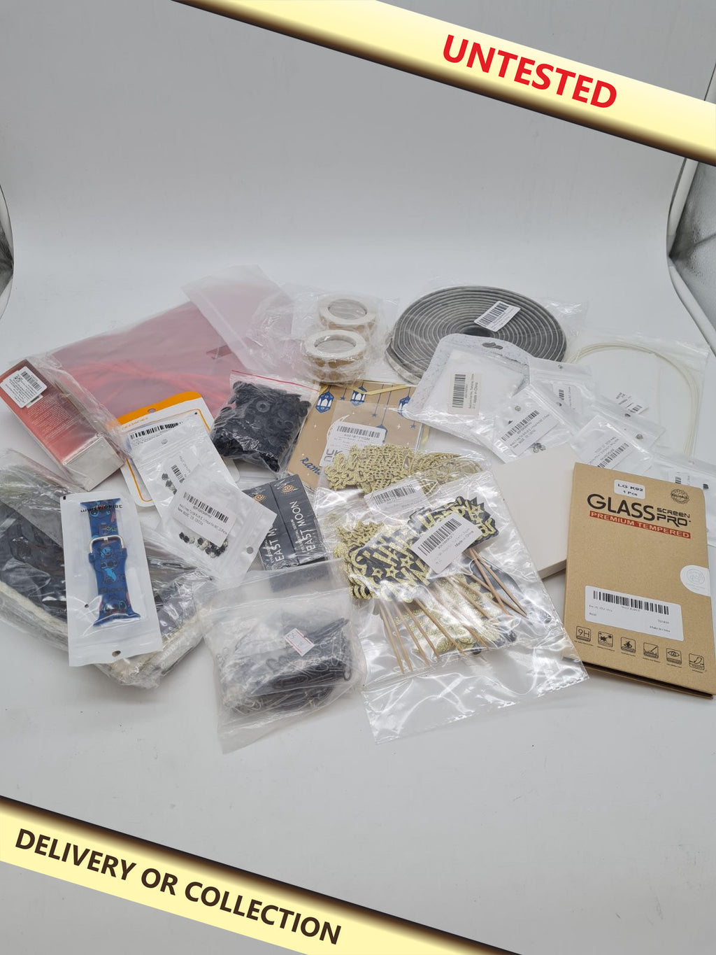 mixed bundle — photograph 1 — Untested; auction delivery information shown on image