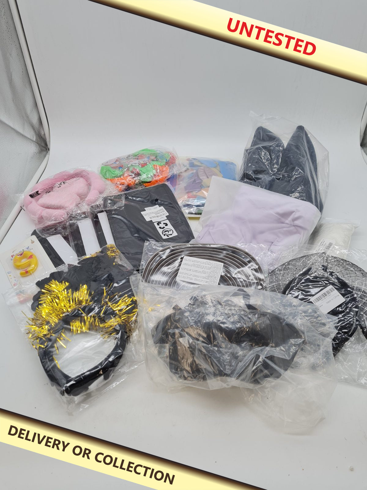 Mixed variety bundle — photograph 1 — Untested; auction delivery information shown on image