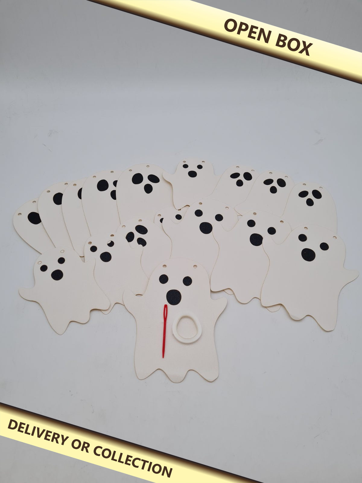 Halloween Ghost Garland Craft Kit — photograph 1 — Open box; auction delivery information shown on image