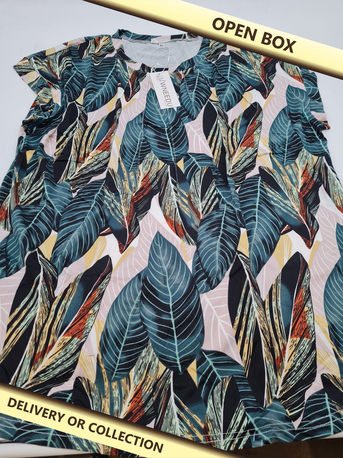 Women's Leaf Print Shirt WEEU51335 Size XL — photograph 1 — Open box; auction delivery information shown on image