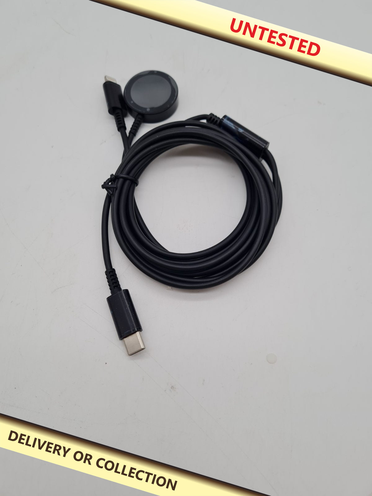USB-C to Lightning and smartwatch charging cable — photograph 1 — Untested; auction delivery information shown on image
