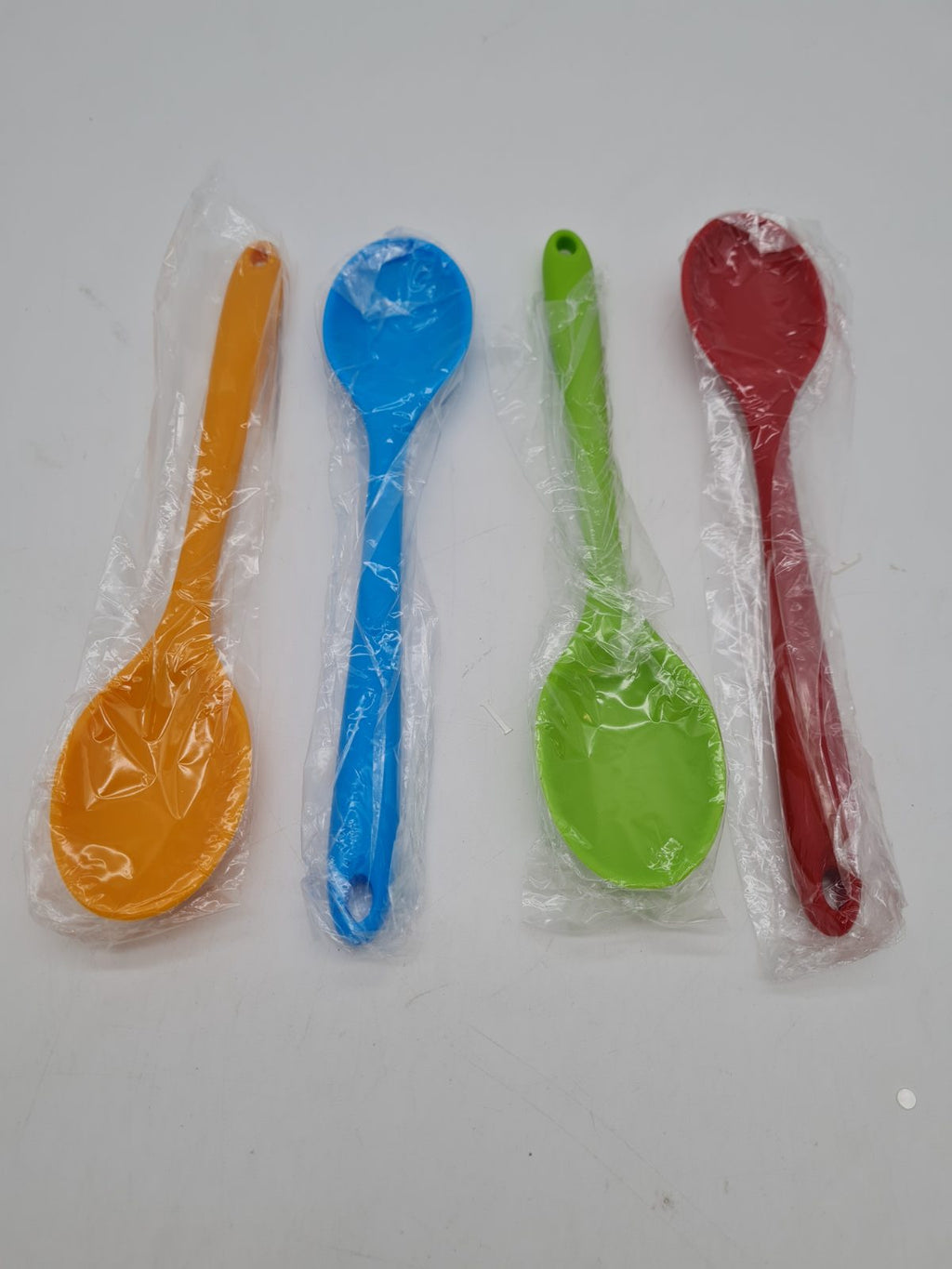 Set of 4 Plastic Kitchen Spoons â€” photograph 1