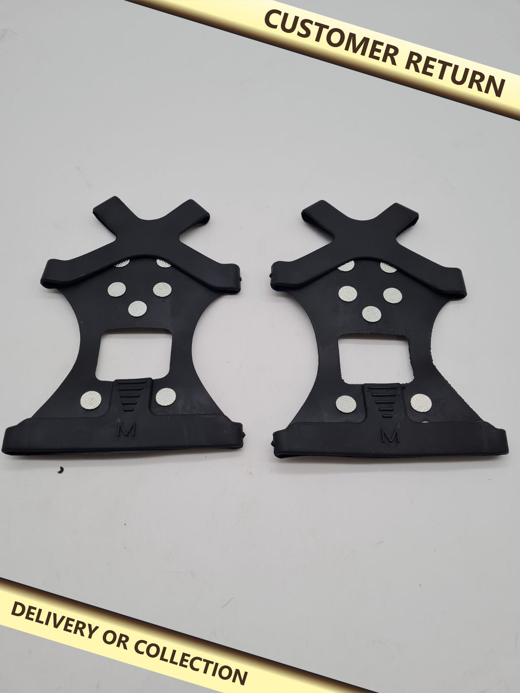 Pair of Studded Shoe Ice Grips Size M â€” photograph 1 — Customer return; auction delivery information shown on image