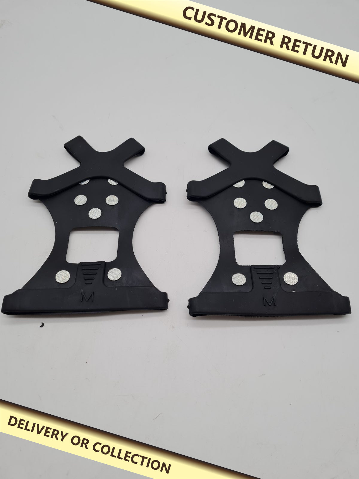 Pair of Studded Shoe Ice Grips Size M â€” photograph 1 — Customer return; auction delivery information shown on image