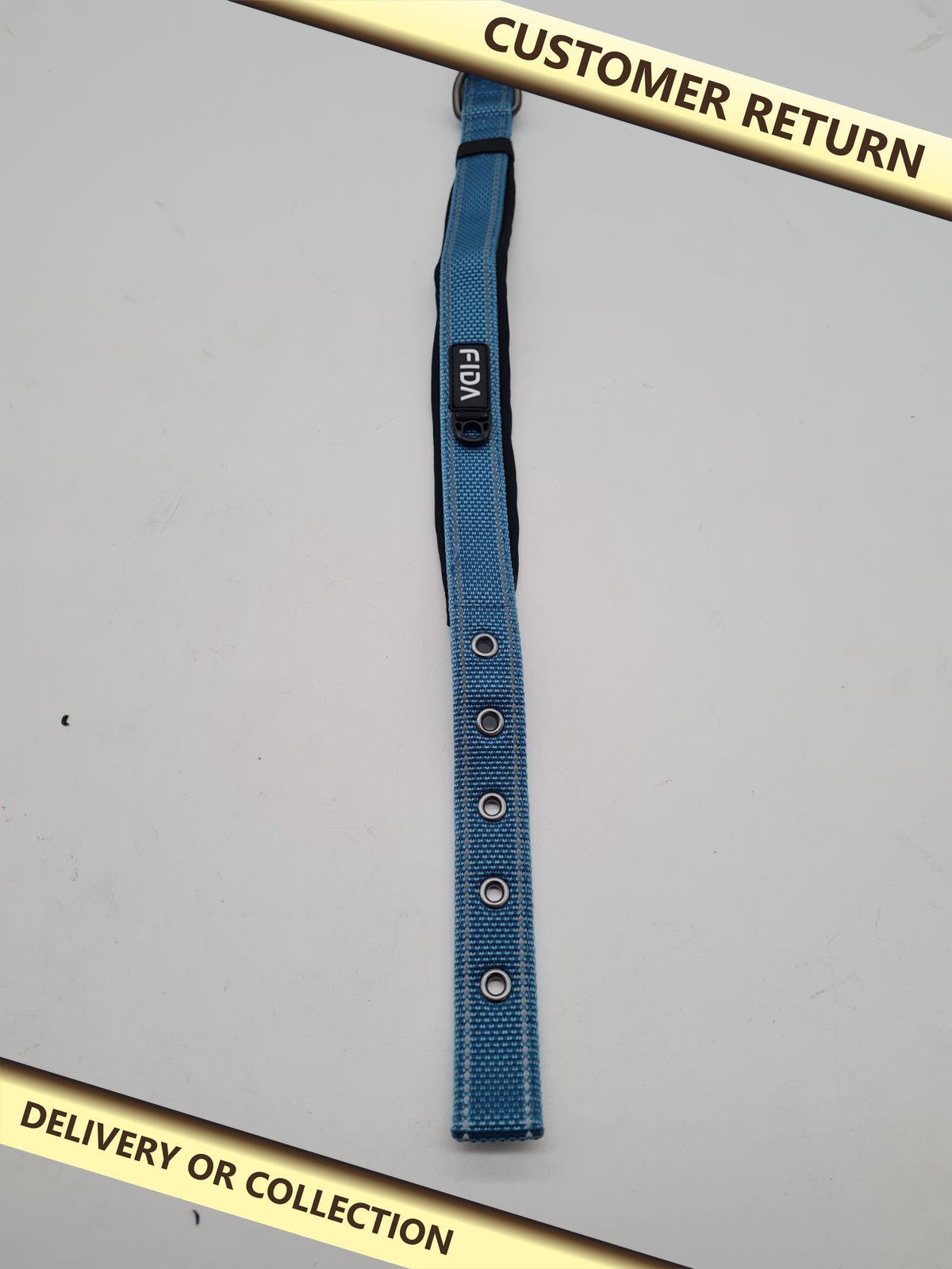 FIDA Padded Dog Collar in blue — photograph 1 — Customer return; auction delivery information shown on image