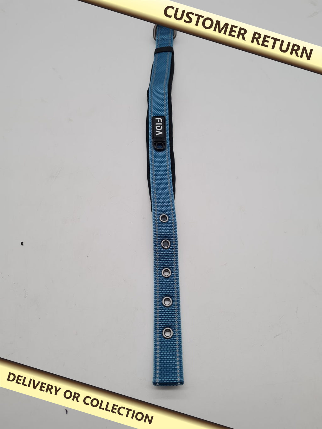 FIDA Padded Dog Collar in blue â€” photograph 1 — Customer return; auction delivery information shown on image