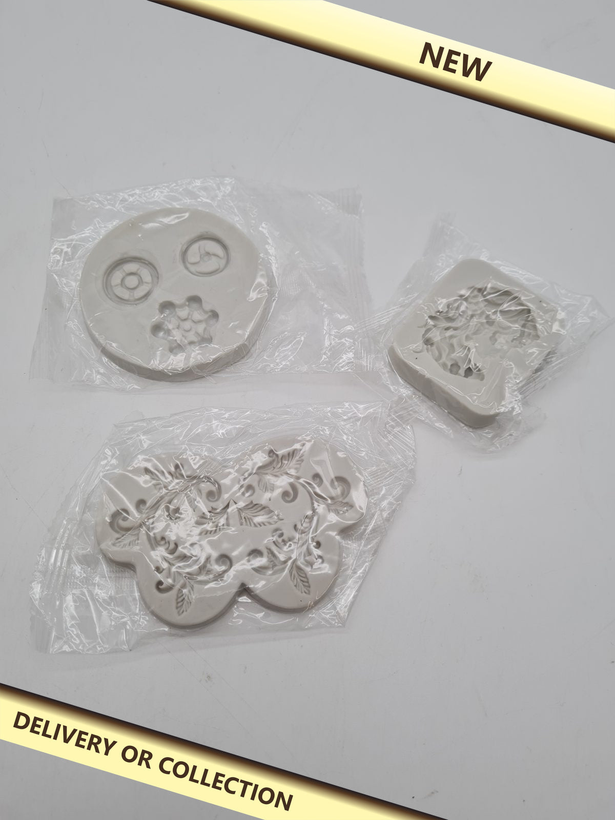 Set of 3  fondant moulds â€” photograph 1 — New; auction delivery information shown on image