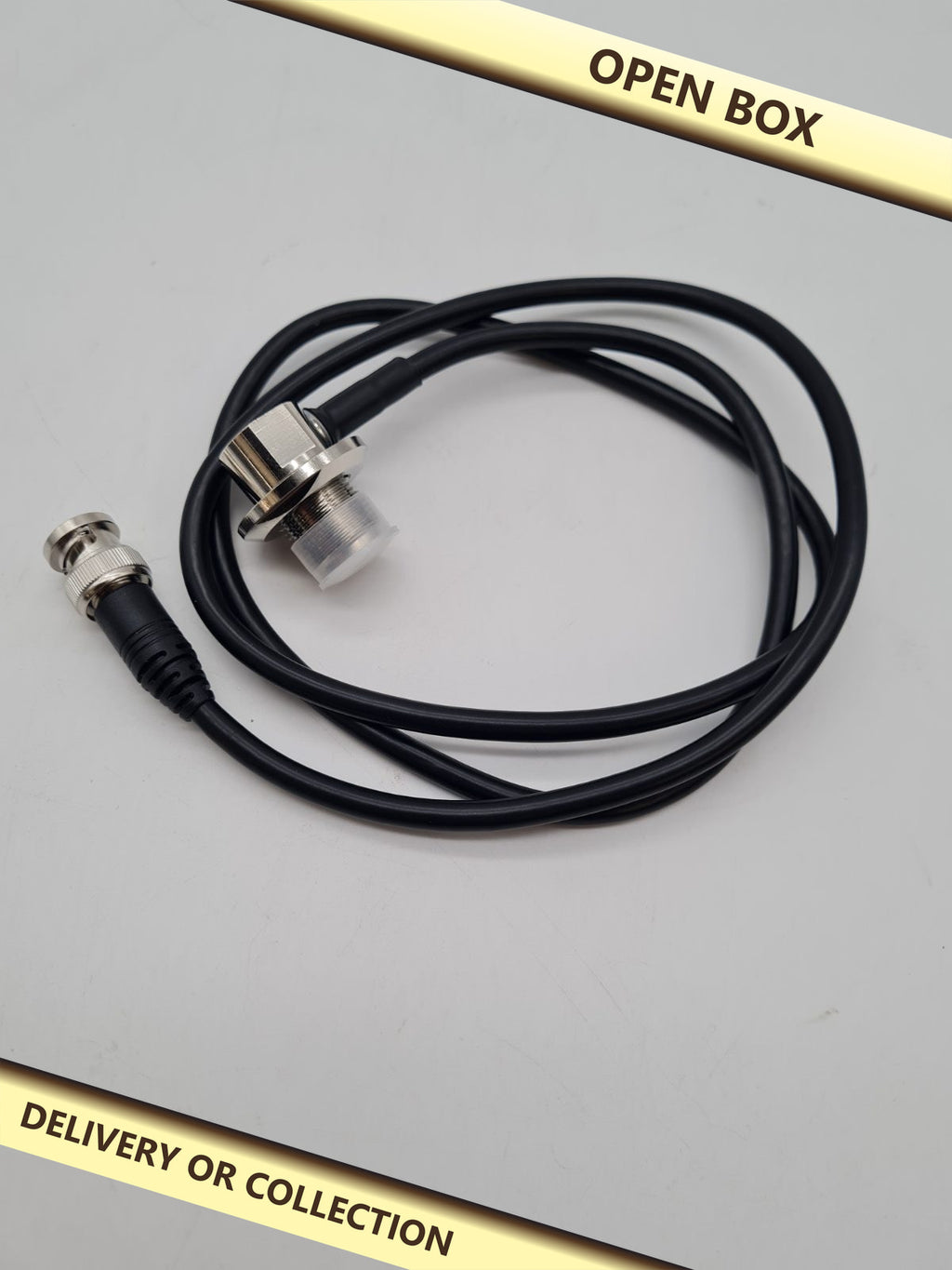 Coaxial Adapter Cable with Bulkhead Socket â€” photograph 1 — Open box; auction delivery information shown on image