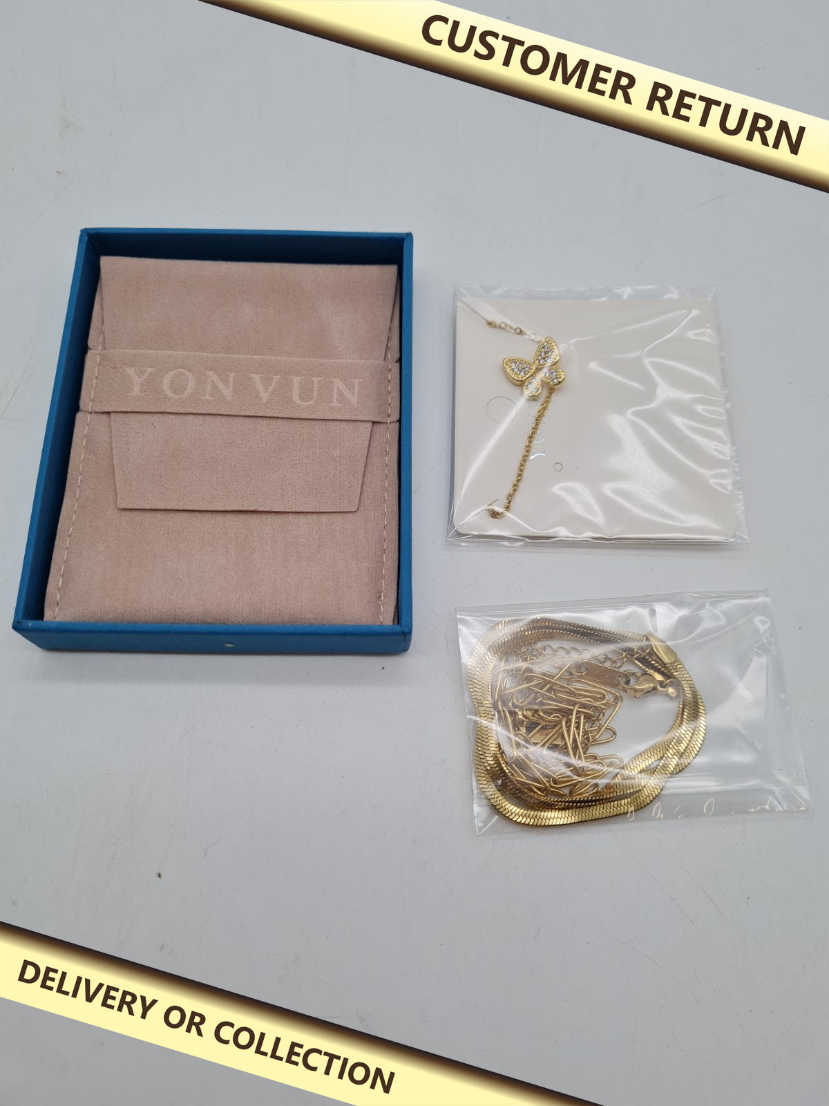 YONVUN Multi-Strand Butterfly Pendant Necklace â€” photograph 1 — Customer return; auction delivery information shown on image