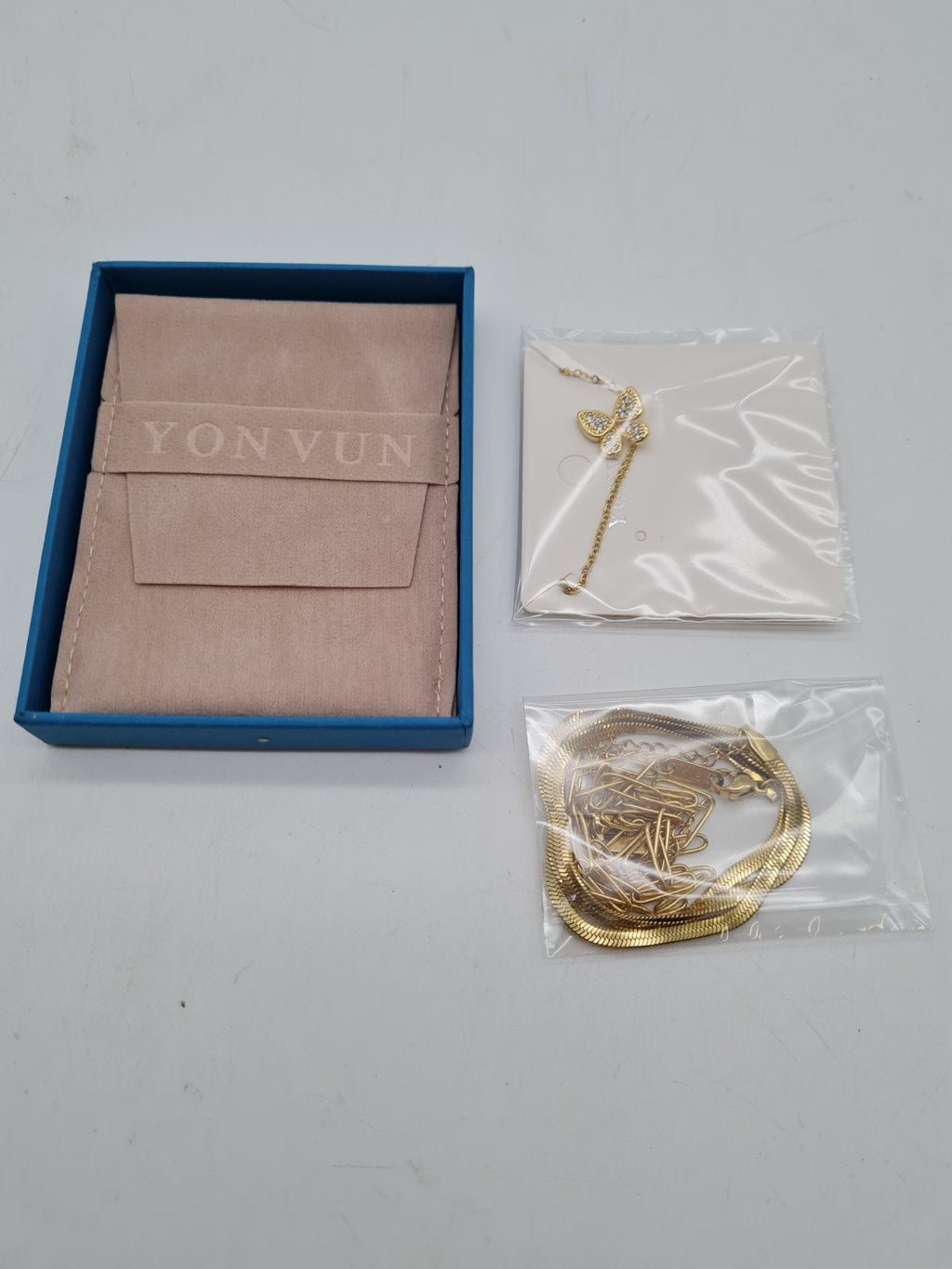 YONVUN Multi-Strand Butterfly Pendant Necklace â€” photograph 1