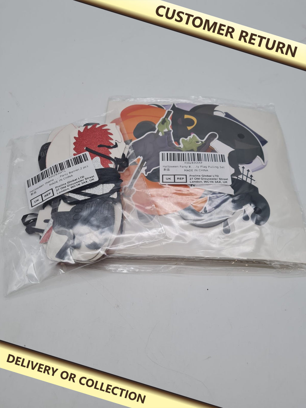 Halloween banner 2 sets — photograph 1 — Customer return; auction delivery information shown on image