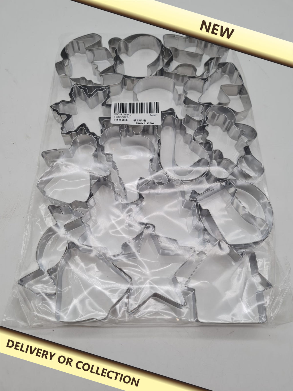 25-Piece Christmas Cookie Cutter Set — photograph 1 — New; auction delivery information shown on image
