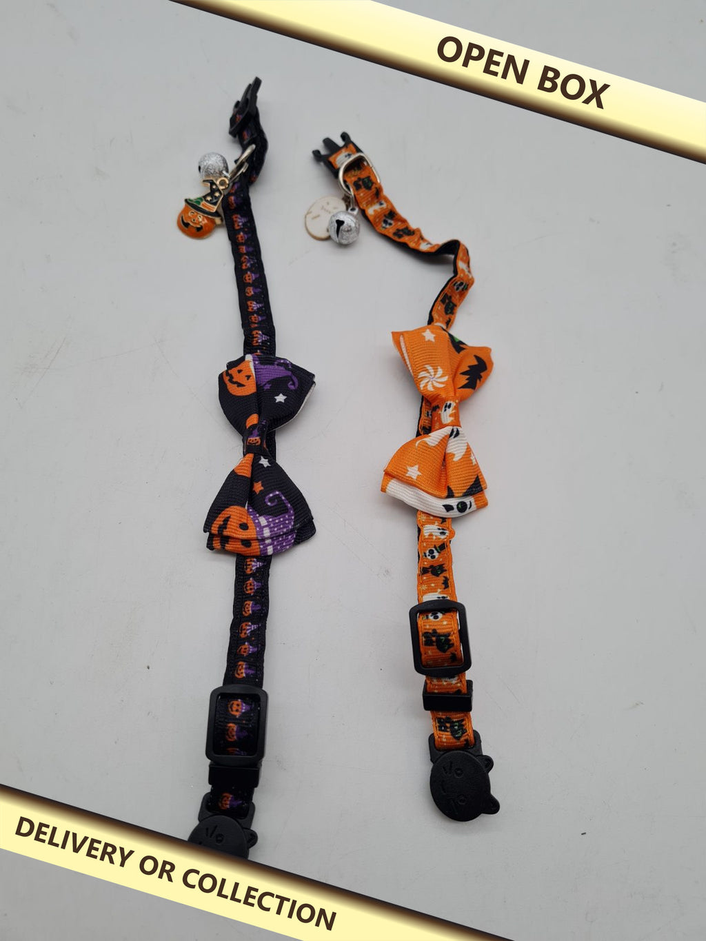 2-Piece Halloween Cat Collar Set with Bells and Bow Ties â€” photograph 1 — Open box; auction delivery information shown on image