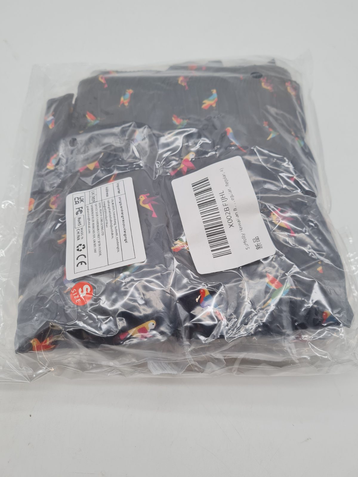 Bird-print swim shorts â€” photograph 3