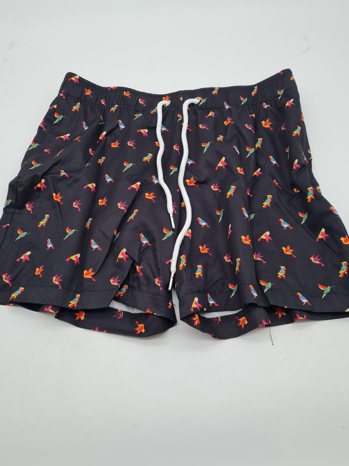 Bird-print swim shorts â€” photograph 1