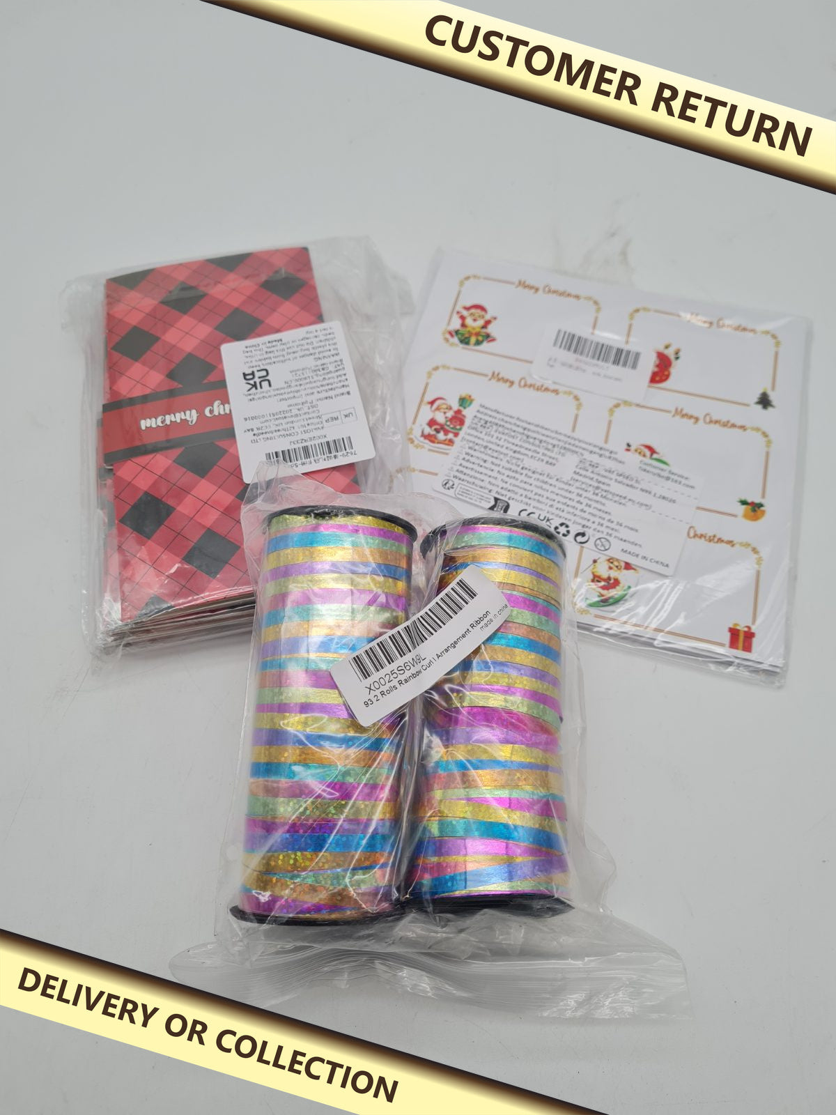 Christmas bundle â€” photograph 1 — Customer return; auction delivery information shown on image