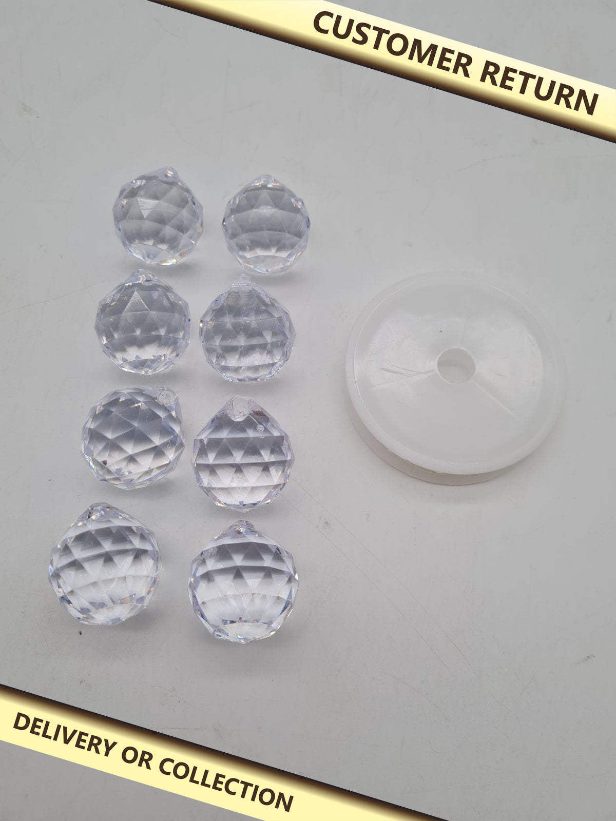 Pack of 8 Hanging Faceted Crystal-Effect Decorations â€” photograph 1 — Customer return; auction delivery information shown on image