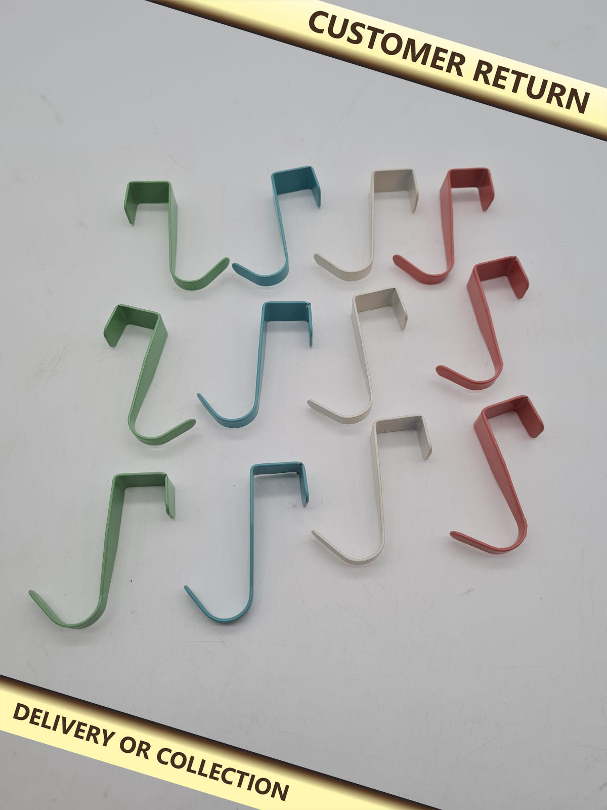 Set of 12 Over-Door Hooks â€” photograph 1 — Customer return; auction delivery information shown on image