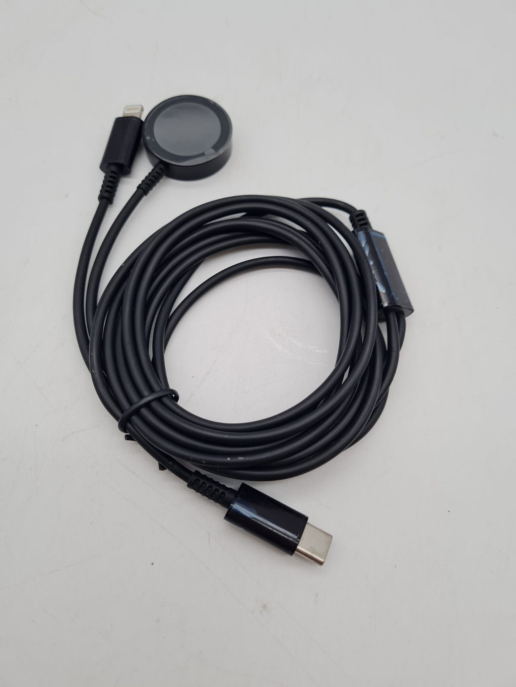 USB-C to Lightning and smartwatch charging cable â€” photograph 2