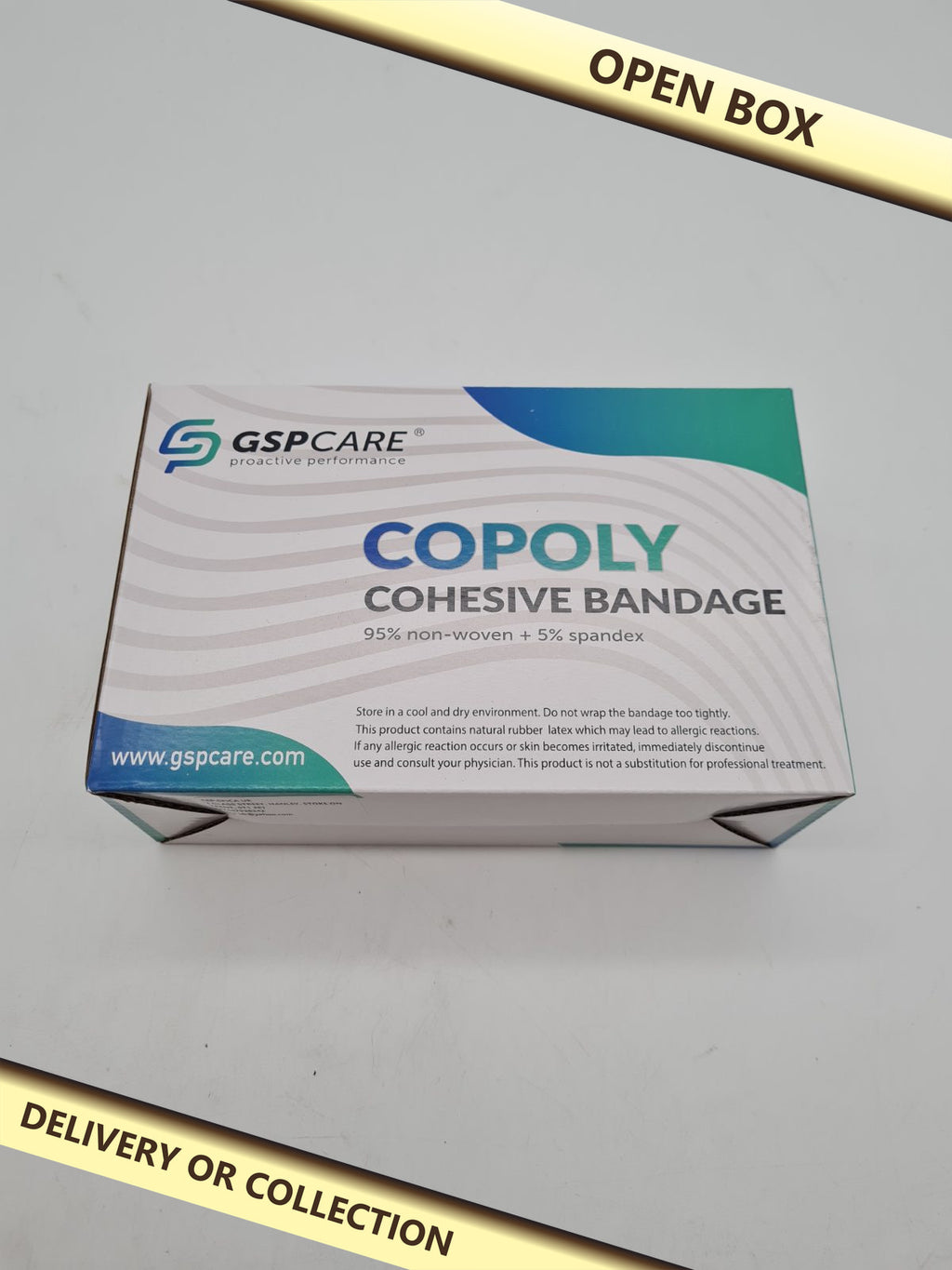 Set of 4 GSPCARE Copoly Cohesive Bandage Rolls — photograph 1 — Open box; auction delivery information shown on image