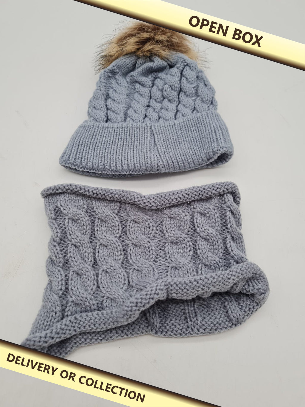 toddler Cable-Knit Hat and Snood Set — photograph 1 — Open box; auction delivery information shown on image