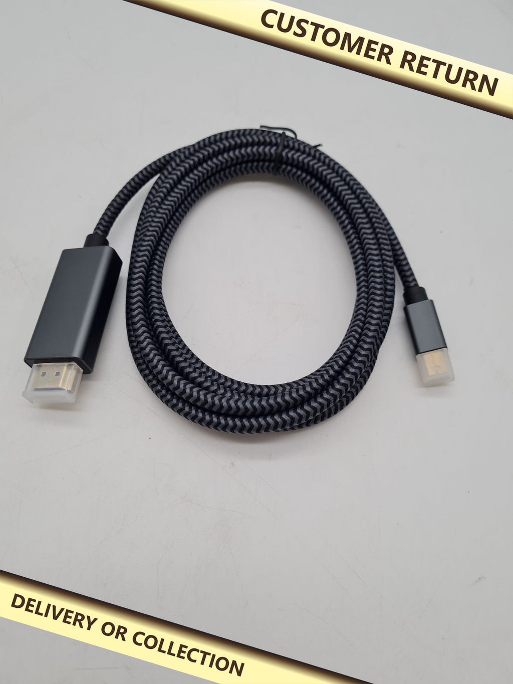 Mini DisplayPort to HDMI Cable — photograph 1 — Customer return; auction delivery information shown on image