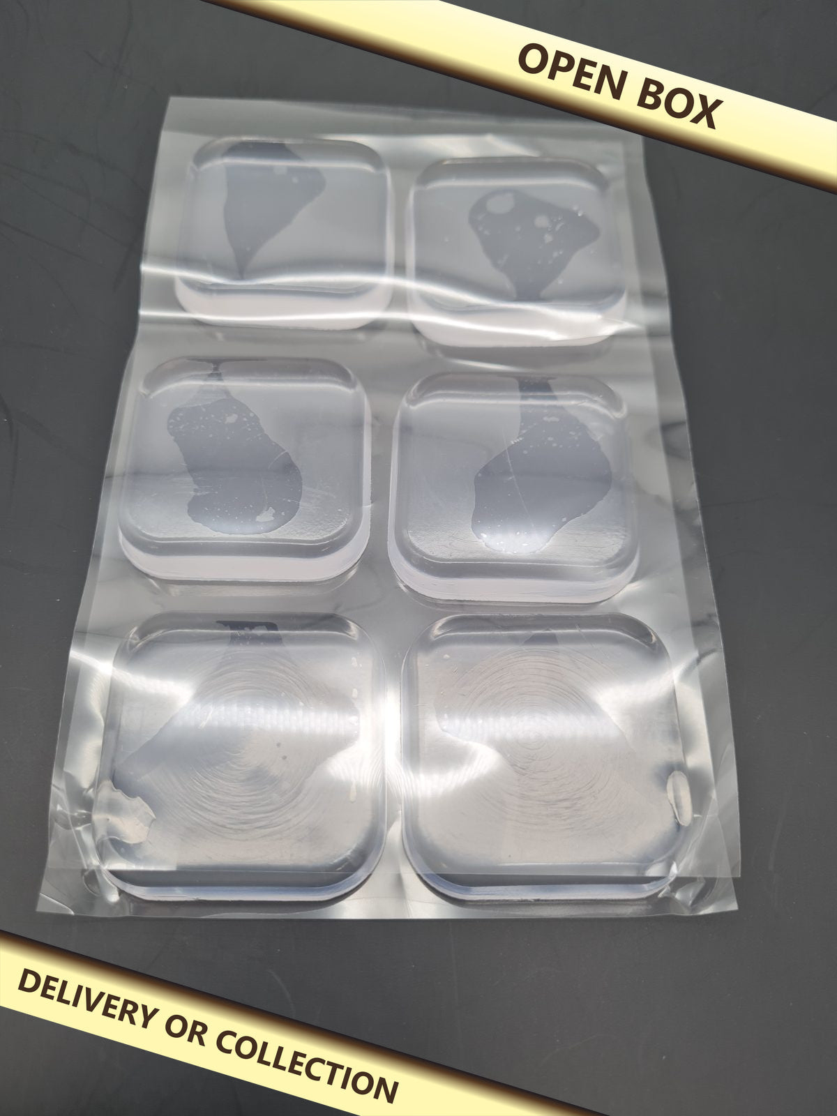 Clear Square Self-Adhesive Cabinet Door Knob Set — photograph 1 — Open box; auction delivery information shown on image