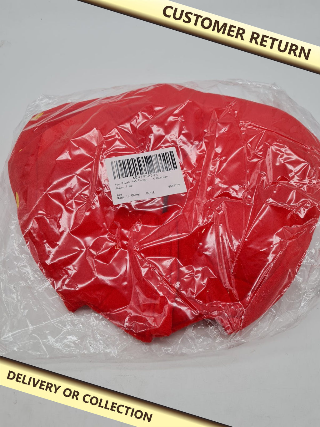 Strawberry Plush Novelty Hat â€” photograph 1 — Customer return; auction delivery information shown on image