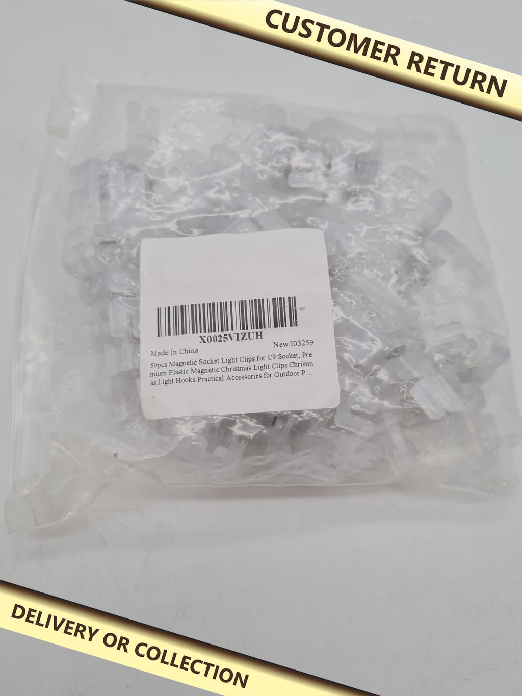 Magnetic Light Socket Clips 50pcs — photograph 1 — Customer return; auction delivery information shown on image