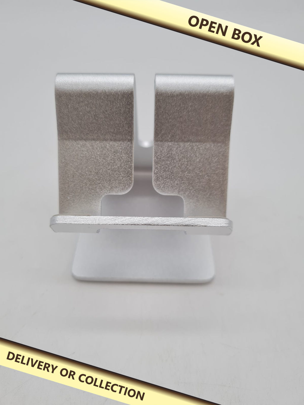 Mobile Phone Desk Stand — photograph 1 — Open box; auction delivery information shown on image