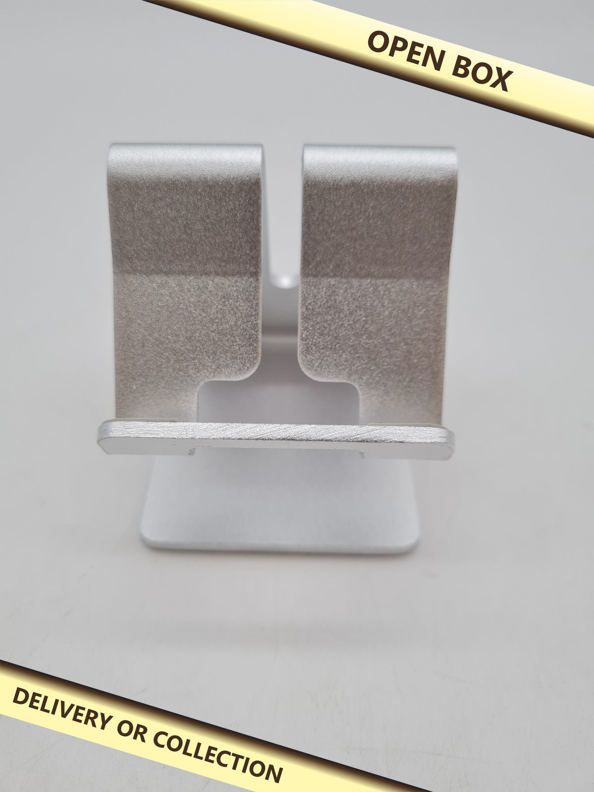 Mobile Phone Desk Stand — photograph 1 — Open box; auction delivery information shown on image