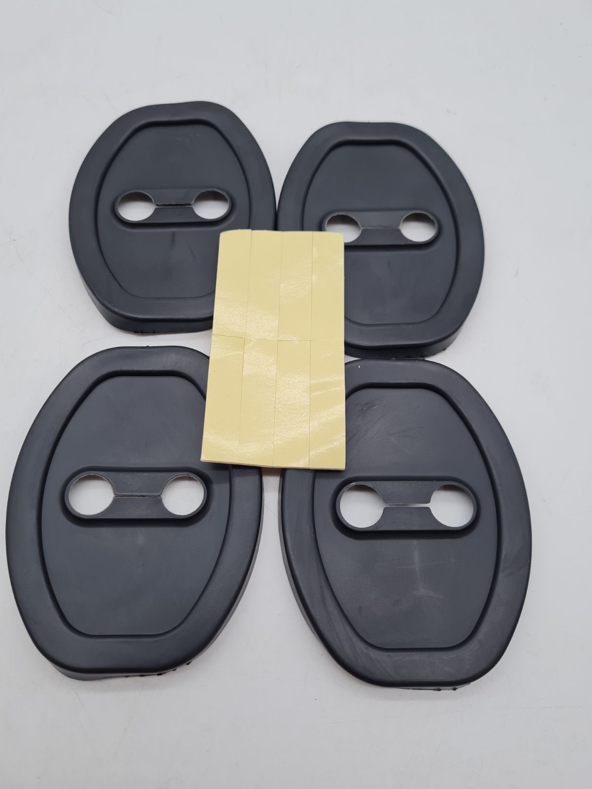 Set of 4 Car Door Lock Striker Protective Covers â€” photograph 1