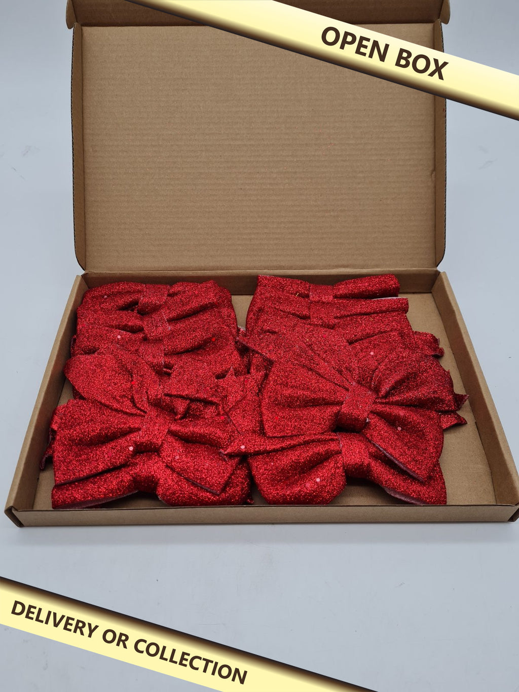 Red Glitter Christmas Decorative Bows â€” photograph 1 — Open box; auction delivery information shown on image
