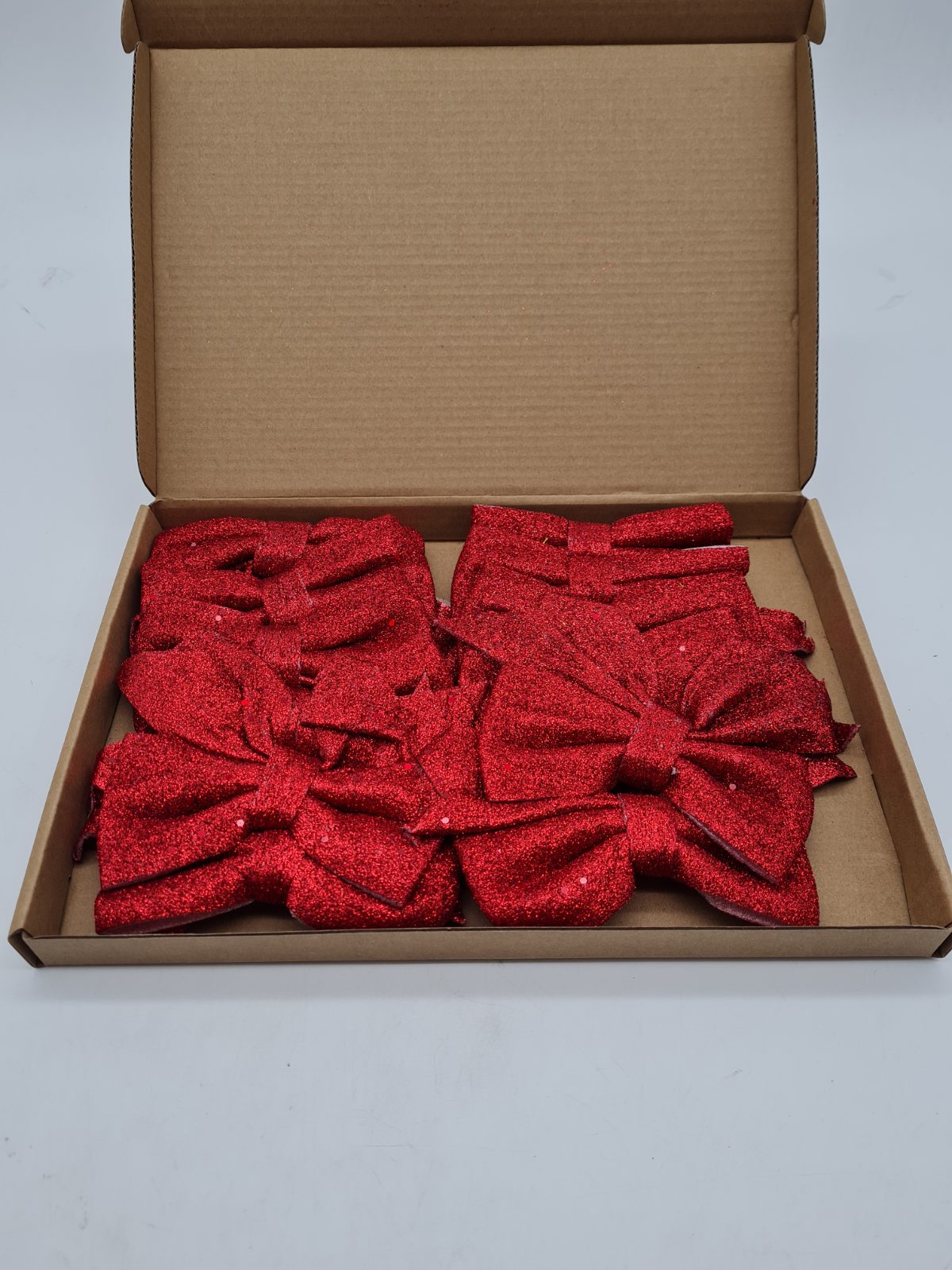 Red Glitter Christmas Decorative Bows — photograph 1