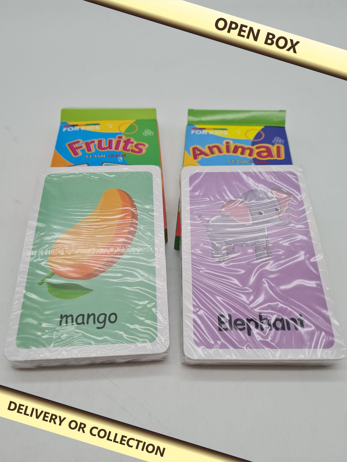 Kids flash cards — photograph 1 — Open box; auction delivery information shown on image