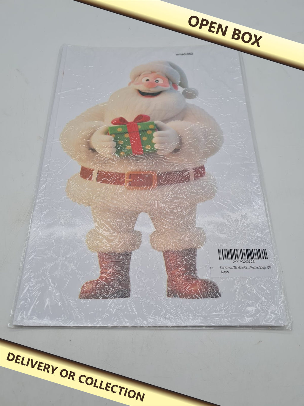 Assorted Christmas Window sticker Decoration Set — photograph 1 — Open box; auction delivery information shown on image