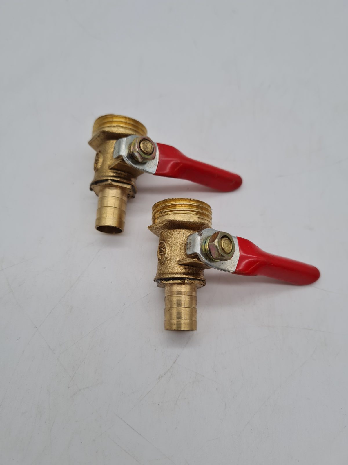 Pair of Brass Hose-Tail Ball Valves — photograph 1