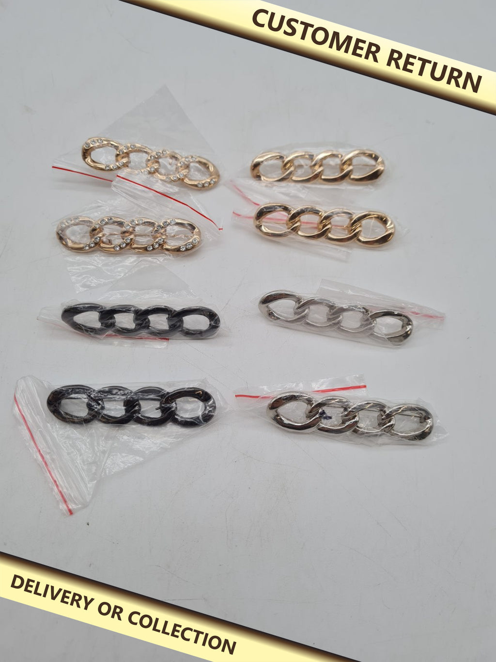 Set of 8 Chain-Link Adjustable Jeans Waist Pins — photograph 1 — Customer return; auction delivery information shown on image