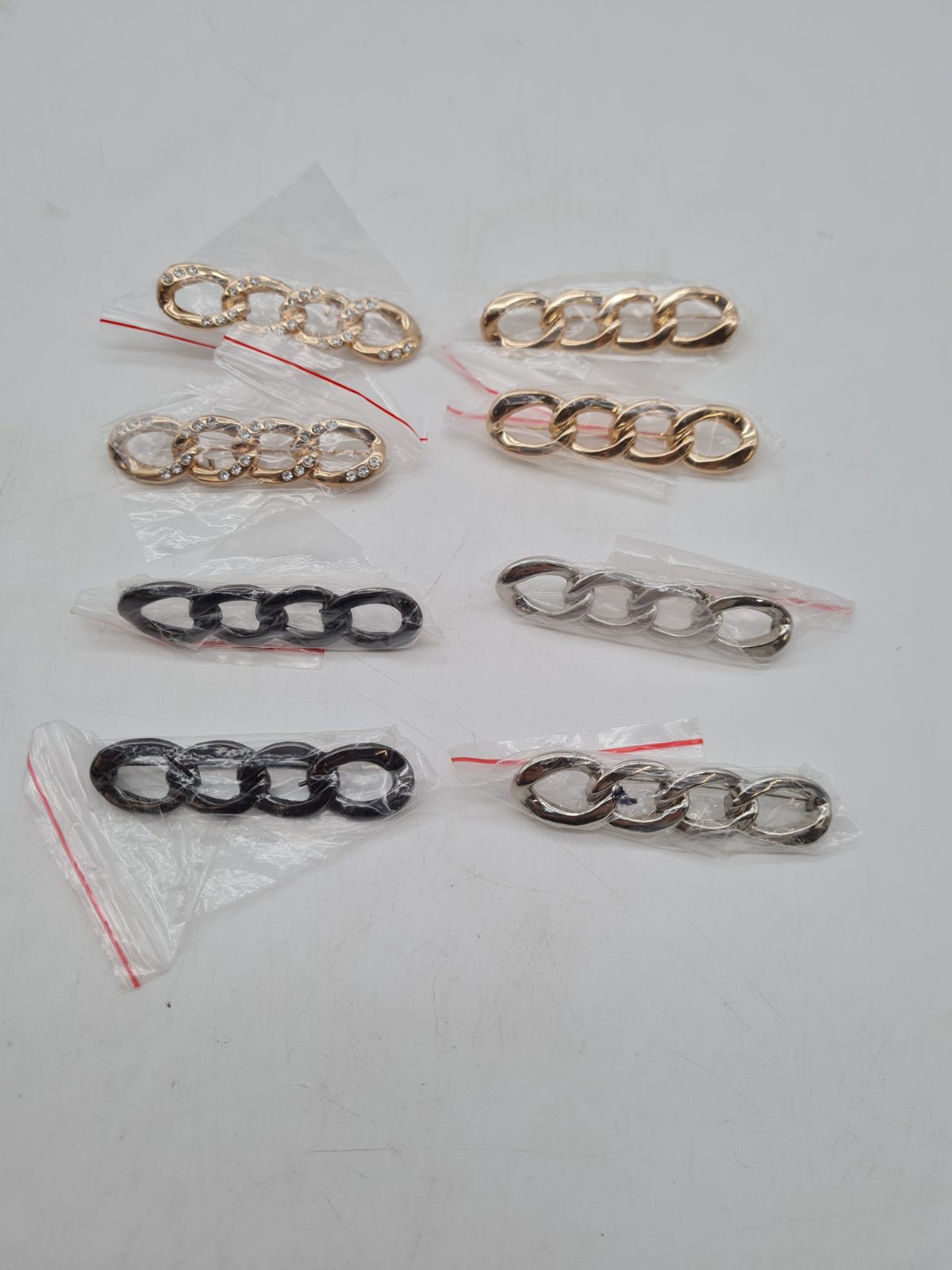 Set of 8 Chain-Link Adjustable Jeans Waist Pins â€” photograph 1