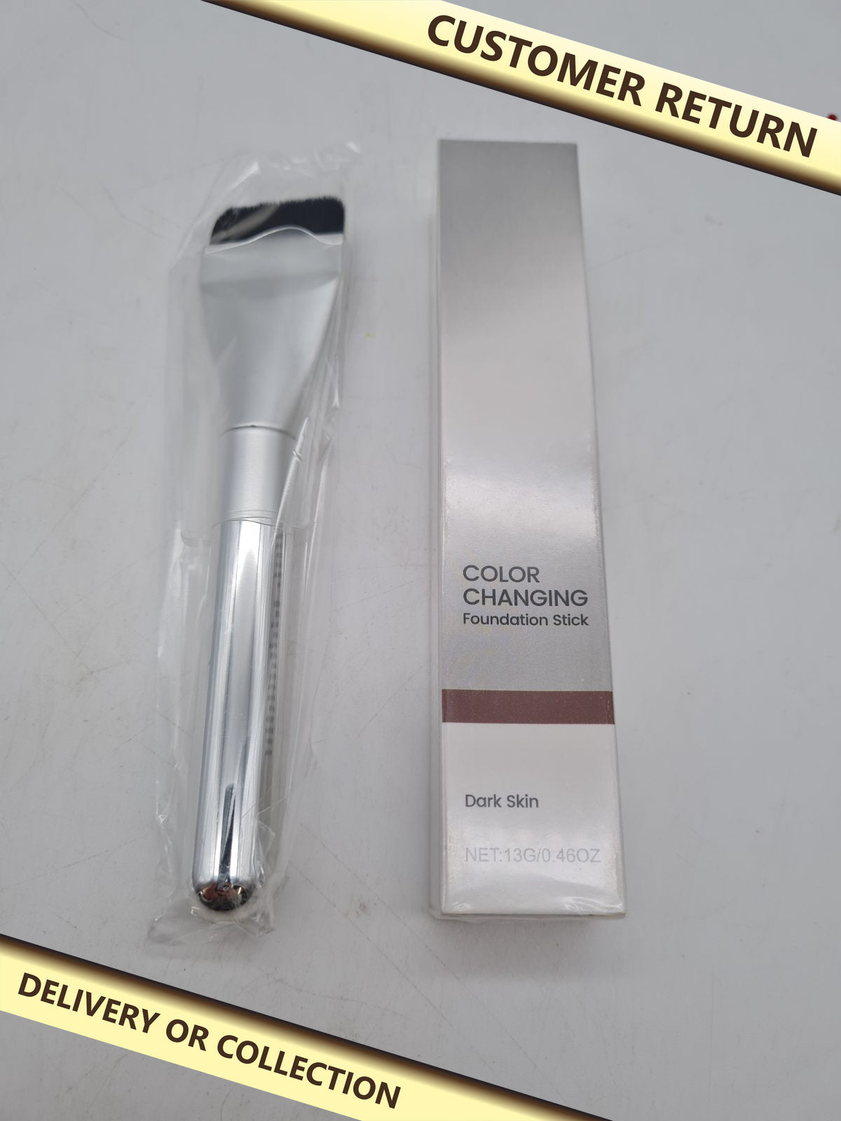Colour-Changing Foundation Stick – Dark Skin, 13g â€” photograph 1 — Customer return; auction delivery information shown on image