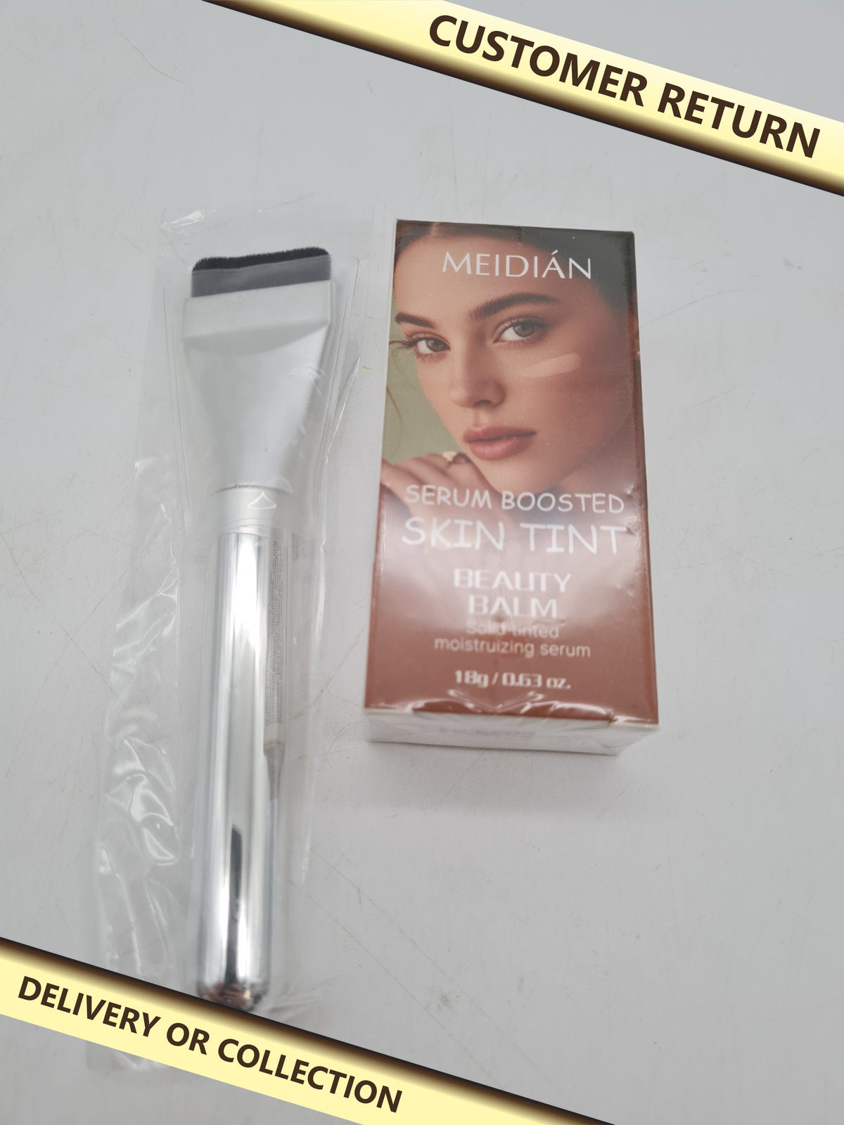 Skin tint beauty balm â€” photograph 1 — Customer return; auction delivery information shown on image
