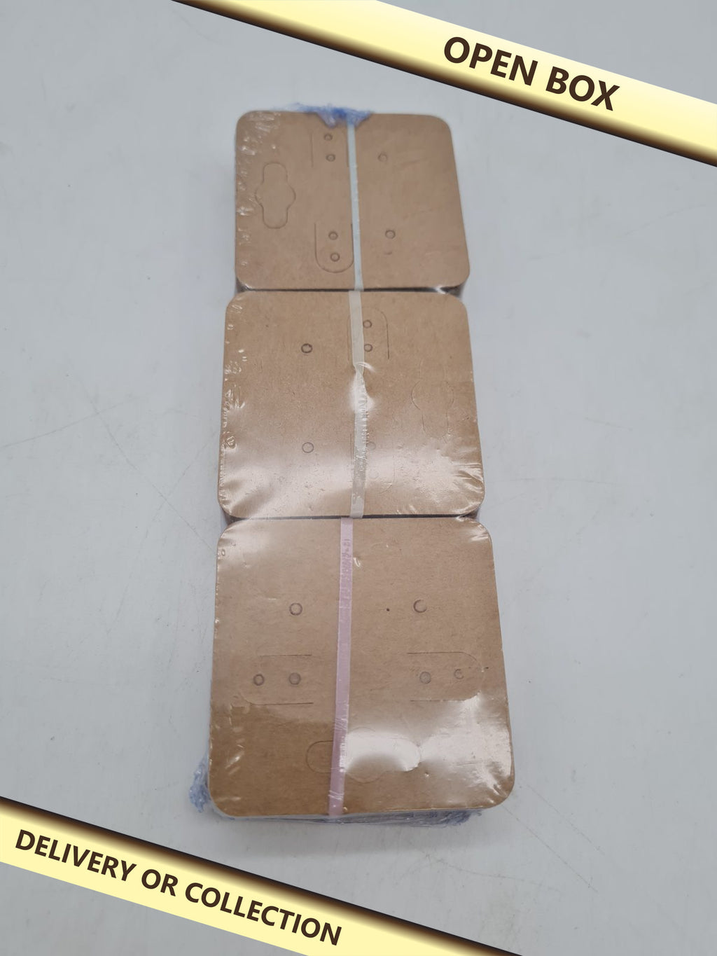 Earring Display Cards — photograph 1 — Open box; auction delivery information shown on image