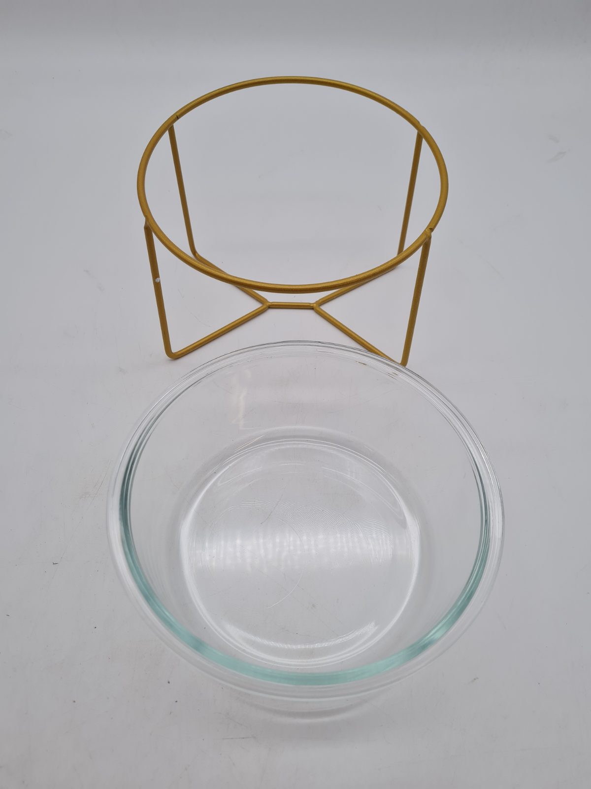 Glass pet feeding bowl with raised metal stand — photograph 2