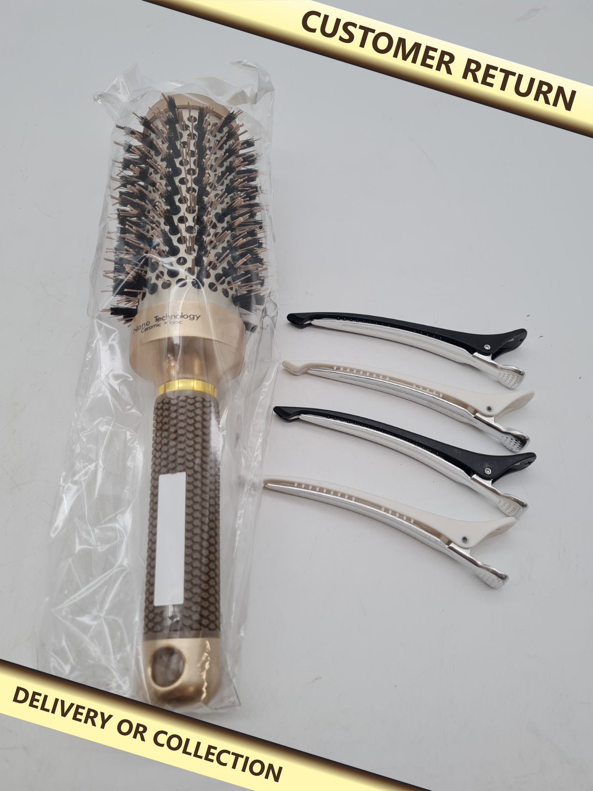 FIXBODY Vented Hair Styling Brush with 4 Sectioning Clips — photograph 1 — Customer return; auction delivery information shown on image