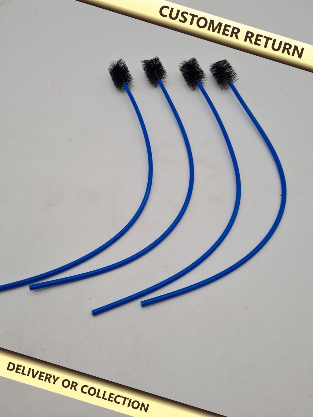 Larrel 4-Piece Flexible Drain Cleaning Brush Set â€” photograph 1 — Customer return; auction delivery information shown on image